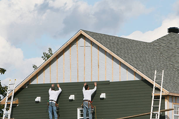 Professional Siding Repair technician working in Bunnlevel, NC
